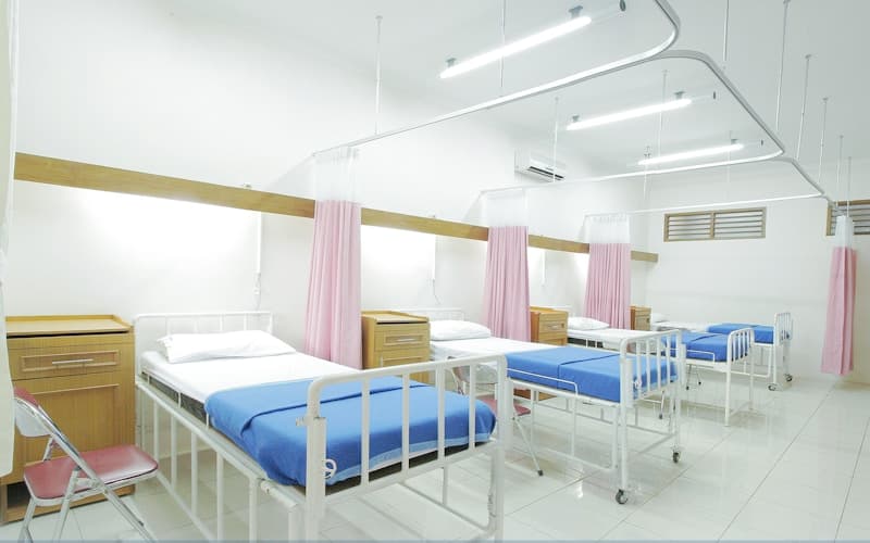 Healthcare professional greeting patient